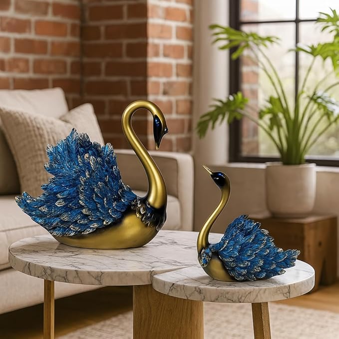 A hand-crafted home decor showpiece featuring an elegant pair of blue swans.